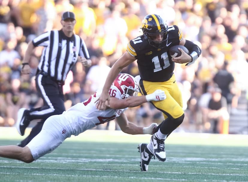 Hawkeyes' Quarterback Battles Injury, Aims to Play Saturday