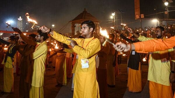 Ayodhya's Saryu Ghat Bustles with Dhanteras Devotees Amid Strict ID Requirements