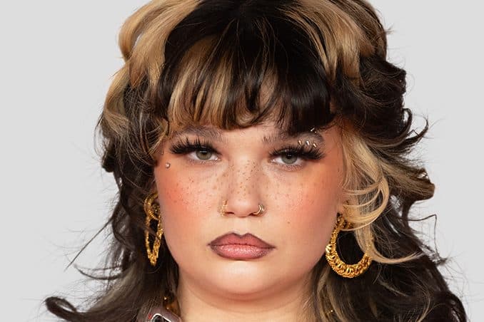 British Singer Lola Young Collapses Onstage, Sparking Concern