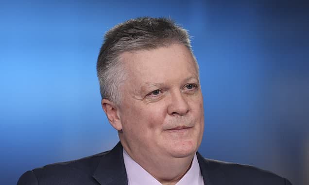 Bank Chief Warns Against Early Rate Cut Cheer