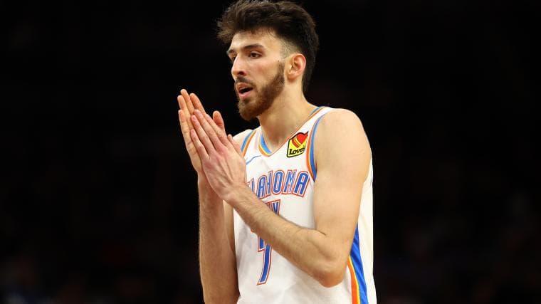 Holmgren Dominates, Earning DPOY Buzz