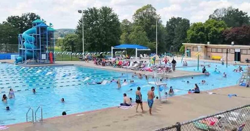 Lifeguard Saves Child from Drowning at Pool