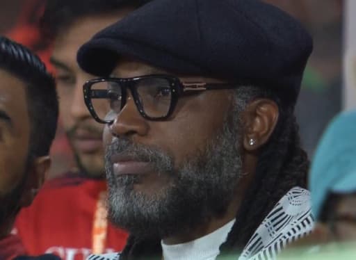 Gayle Spotted Cheering RCB in Stands
