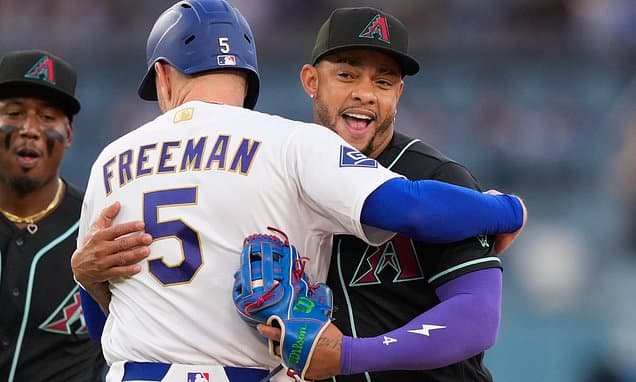 Freeman's First Hit Ends in a Hug!