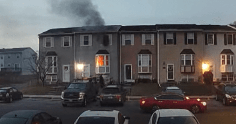 Hero Catches Falling Children from Blaze