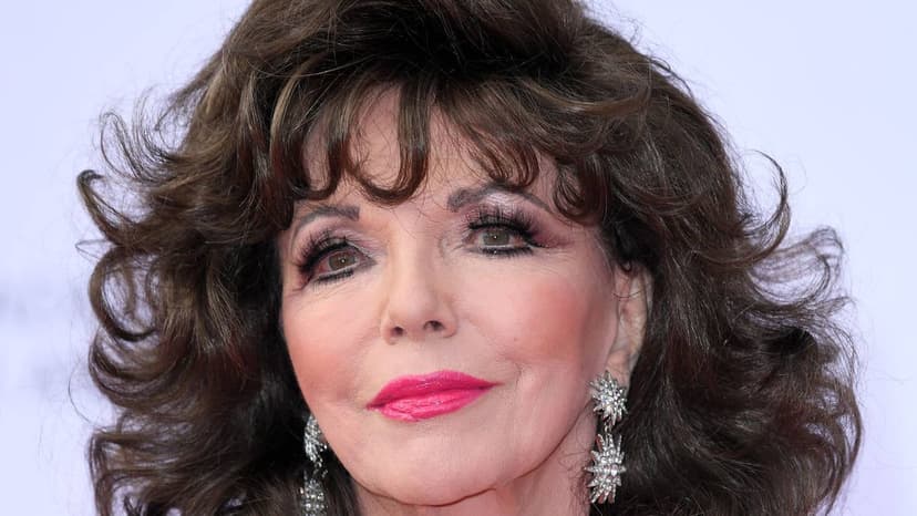 Joan Collins Dazzles in Rosé Suit for M&S Launch