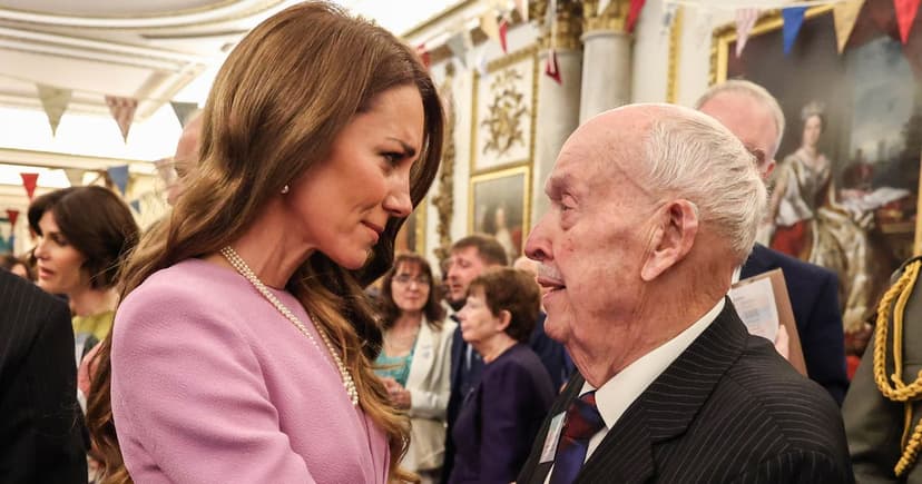 Kate Hugs George Cross Hero at Royal Reception