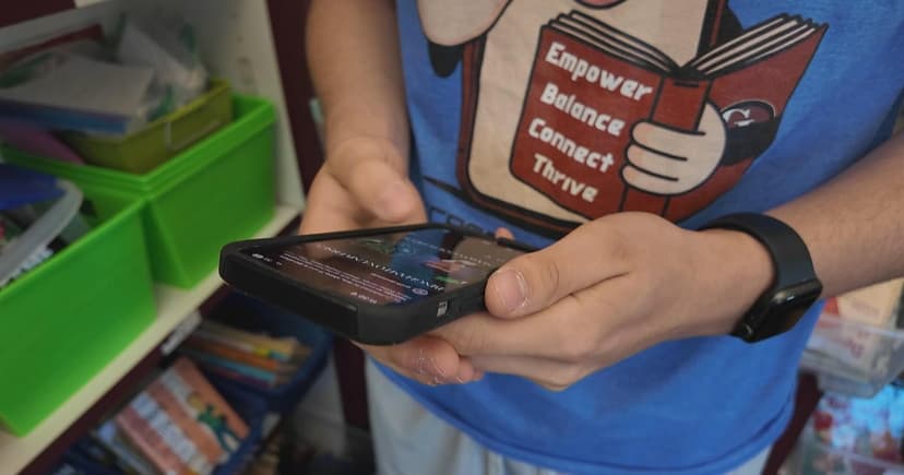 Teens Teach Little Kids Phone Smarts