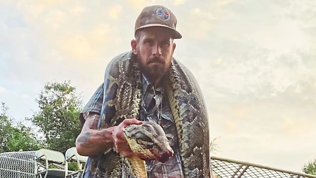 Python Wrangler's Harrowing Encounter: Arm Bitten by 17-Foot Monster