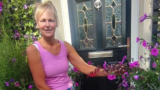 Resident Fights Council Over Beloved Flower Pots: "They Bring Joy to the Village"