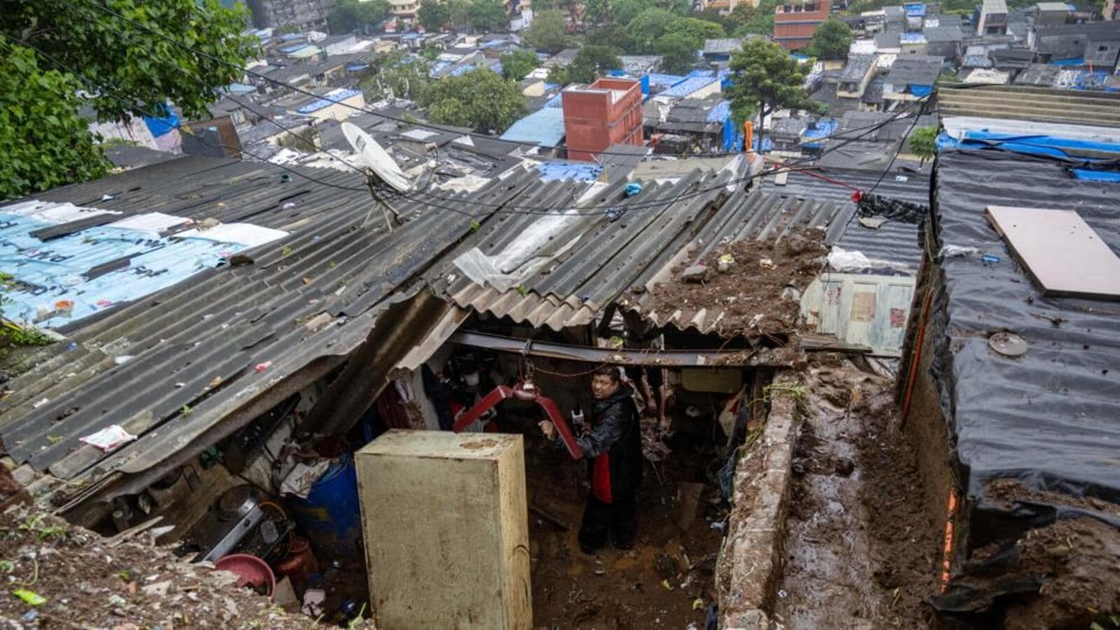Monsoon Mayhem: Deadly Mudslide Kills Father and Daughter in Mumbai Slum