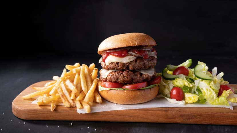 22-Year-Old Fights for Life After Burger Swallowing Stunt Goes Horribly Wrong