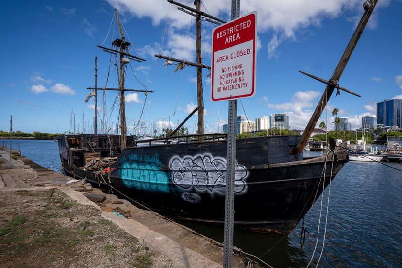 Pirate Boat's Final Voyage: Crushed at Landfill