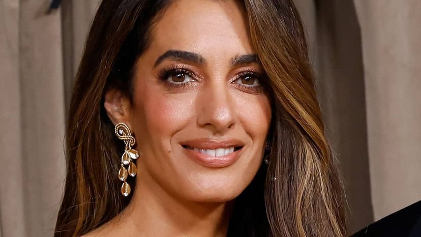 Amal Clooney Dazzles Venice Film Fest in Snake Skirt
