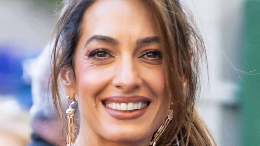 Amal Clooney Stuns in Bridal White on Italian Getaway