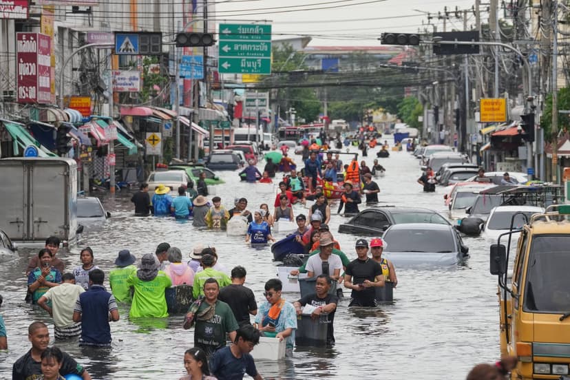 Bangkok Streets Submerged: Life Goes On