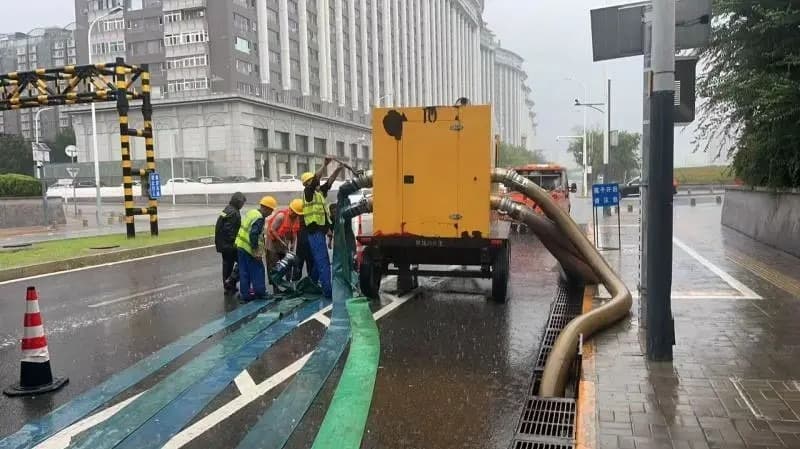 Beijing Rains: 2,700 Workers Battle Typhoon Dolphin