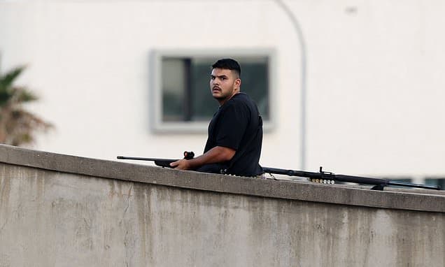 Wife 'Kept Terrorist Father and Son in Check'