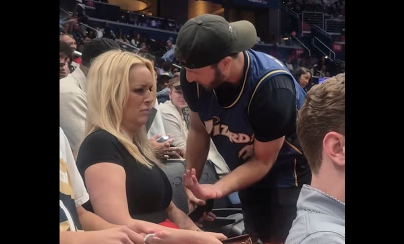 McHenry throws drink at fan in arena spat