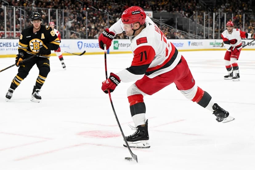 Bruins, Hurricanes Clash: Playoff Race Heats Up