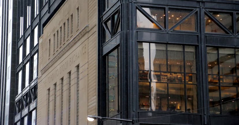 Gold Reaches Record High as TSX Edges Lower