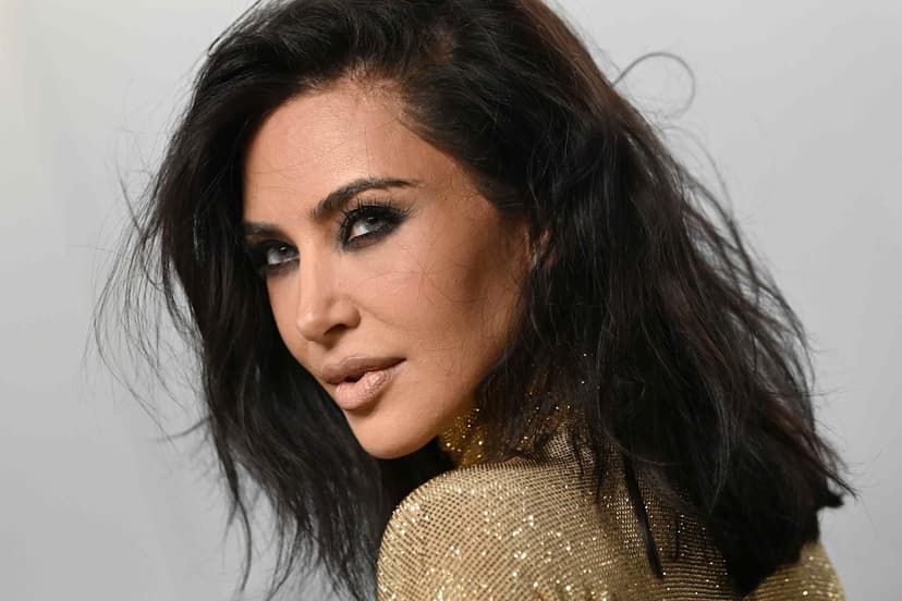 Kardashian Buys JFK Jr. Assistant's Prada Coat