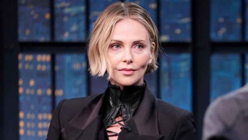 Charlize Theron's Silver Fringe Dress: New Trend Alert?