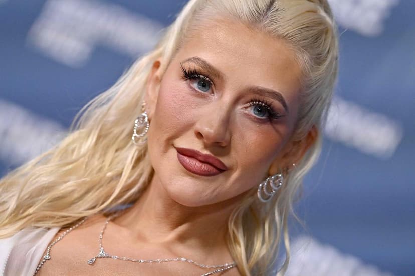 Christina Aguilera Stuns in Custom Corset & Boa