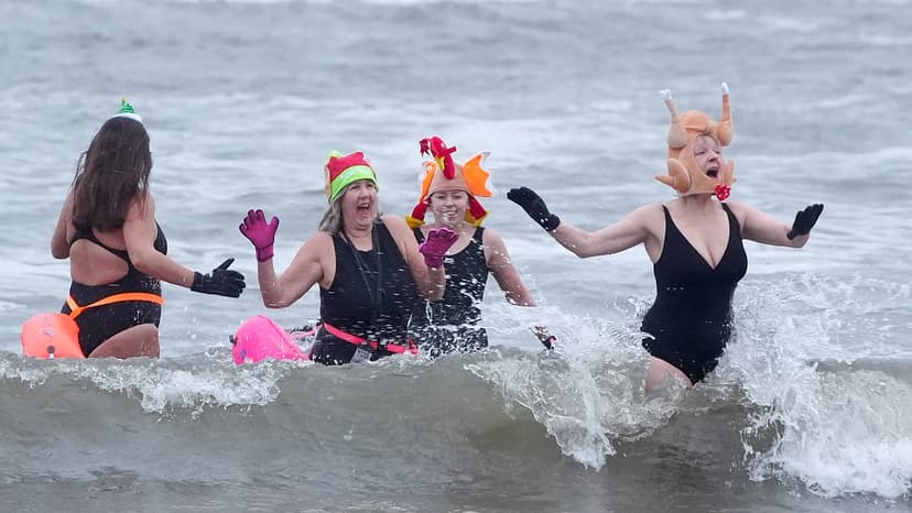 Christmas Eve Swimmers Brave Icy Waters Amid Cold Alert