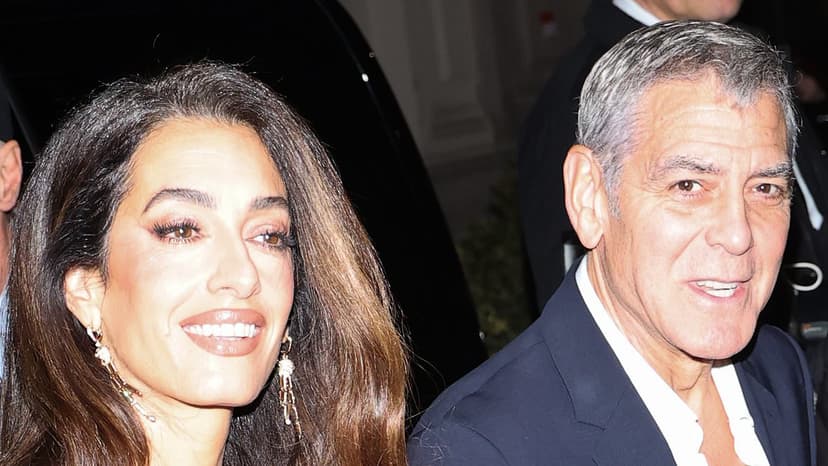 Clooneys Dazzle at Milan Omega House Opening