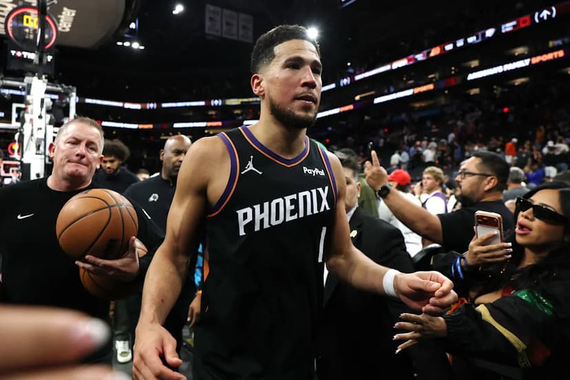 Booker Surprises Fan With Rare Nike Sneakers at Drive-Thru