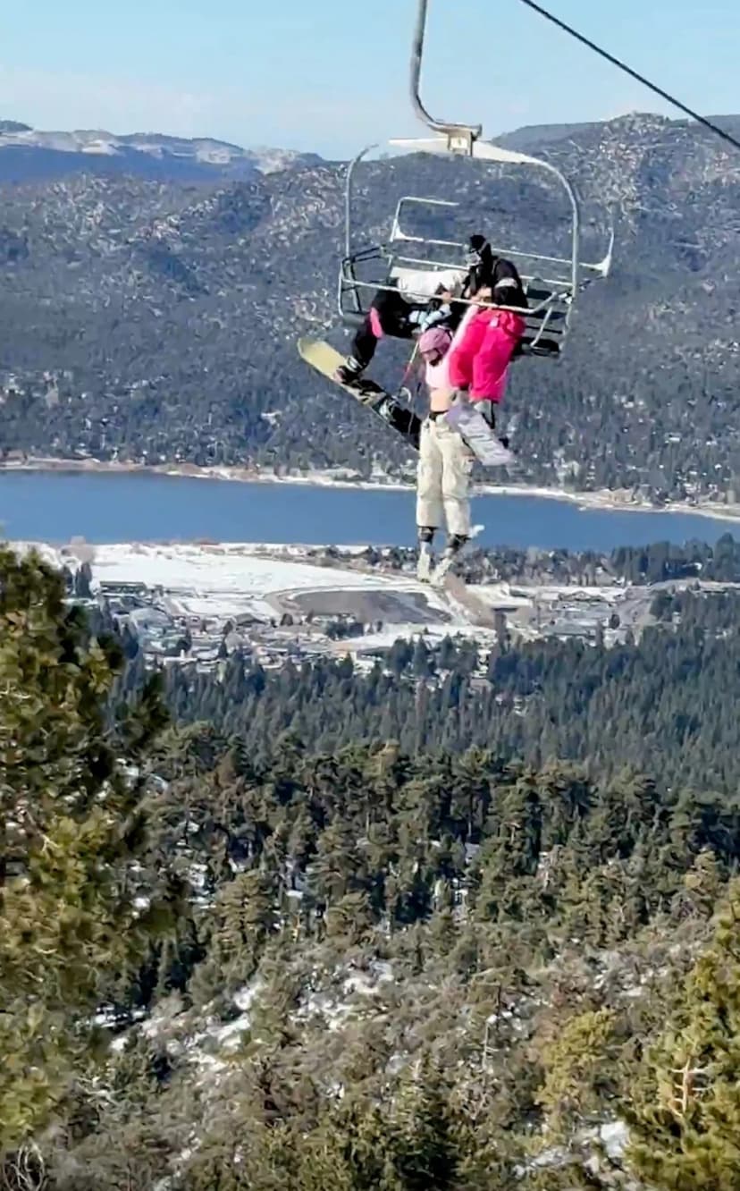 Skier Dangles Precariously in Dramatic Chairlift Rescue