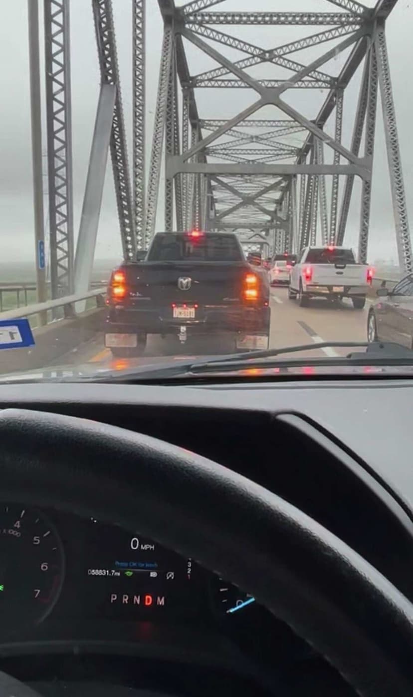 Rainbow Bridge Terror: Drivers Trapped by Storm