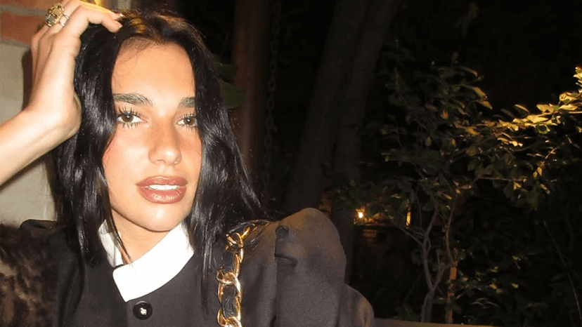 Dua Lipa Shines in Kim K's Crystal Minidress