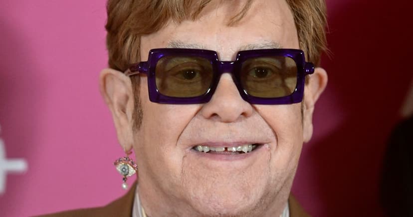Elton John's Kneecaps: From Surgery to Statement Necklace