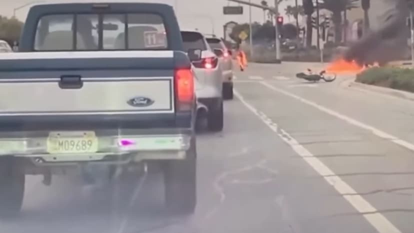 Fiery Crash: Teen Biker Collides with Car, Bursts into Flames