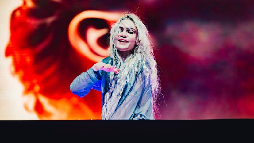 Grimes Claims AI Psychosis, Quits Music for Machine Consciousness