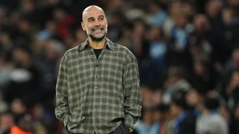 Guardiola brushes off exit talk, eyes City's bright future