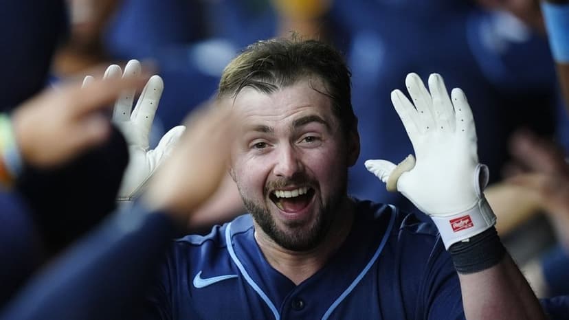 Hicks' Grand Slam Shocks Rockies in Rays' Extra-Inning Thriller