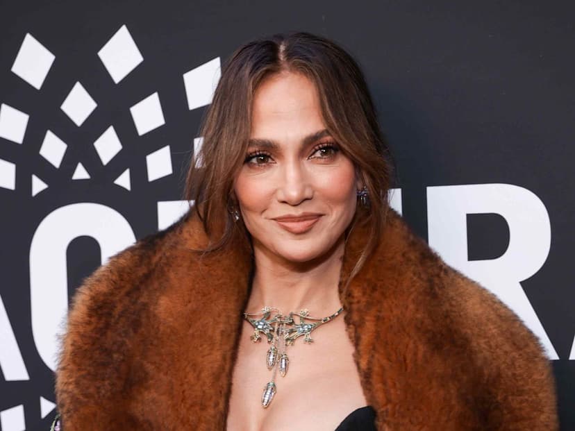 J.Lo Stuns in Plunging Gown and Jeweled Cape