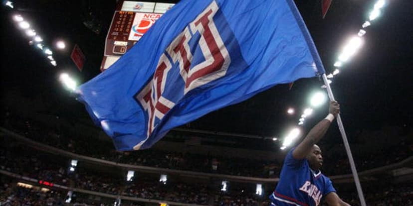 Kansas Coach Injured in Serious Highway Crash