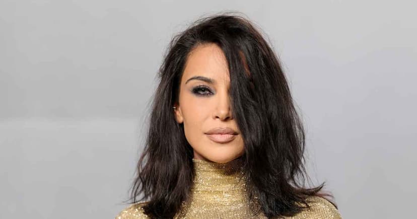 Kardashian's Gold Gucci Gown Dazzles Oscars Afterparty