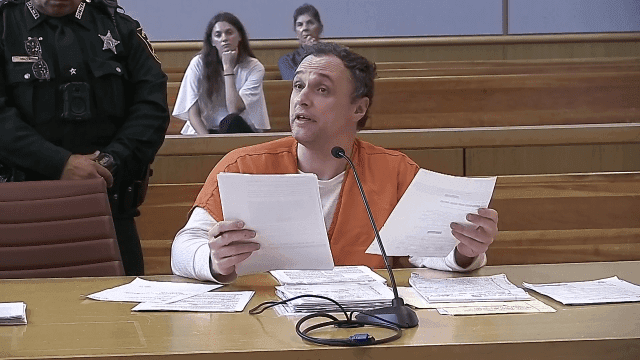 Surgeon Grills Experts in Murder Trial