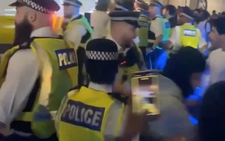 London Riots: Officer Injured Amidst World Cup Fan Chaos