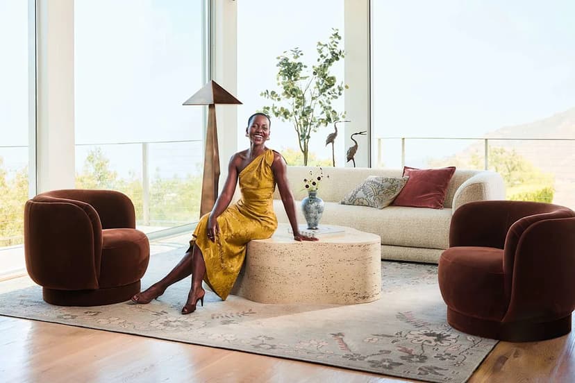 Nyong'o's Balcony Bliss: Tea, Sunsets, and Love Seats