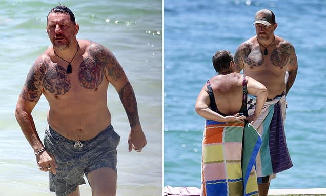 Manu Feildel Flaunts Tattoos at Sydney Beach