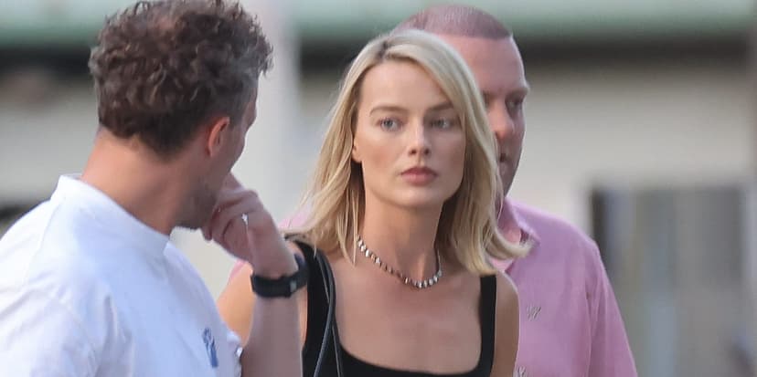 Margot Robbie's Parisian Romance: Black Lace & Vintage Flair