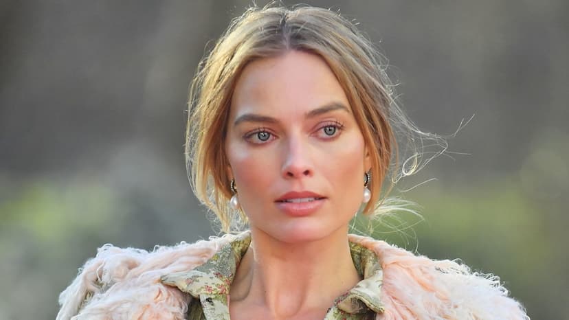 Margot Robbie Stuns in Victorian Corset for Film Promo