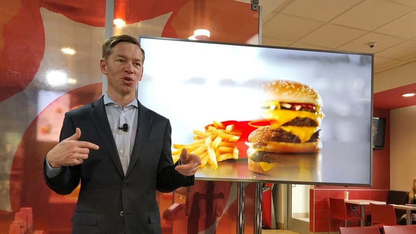 CEO's Burger Bite Goes Viral, Sparks Fast Food Frenzy