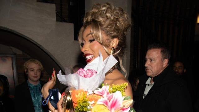 Stallion Stuns in Single-String Sheer Gown